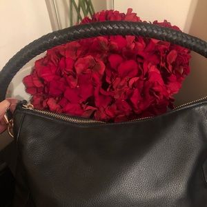 Cole Haan braided handle with navy blue Interior